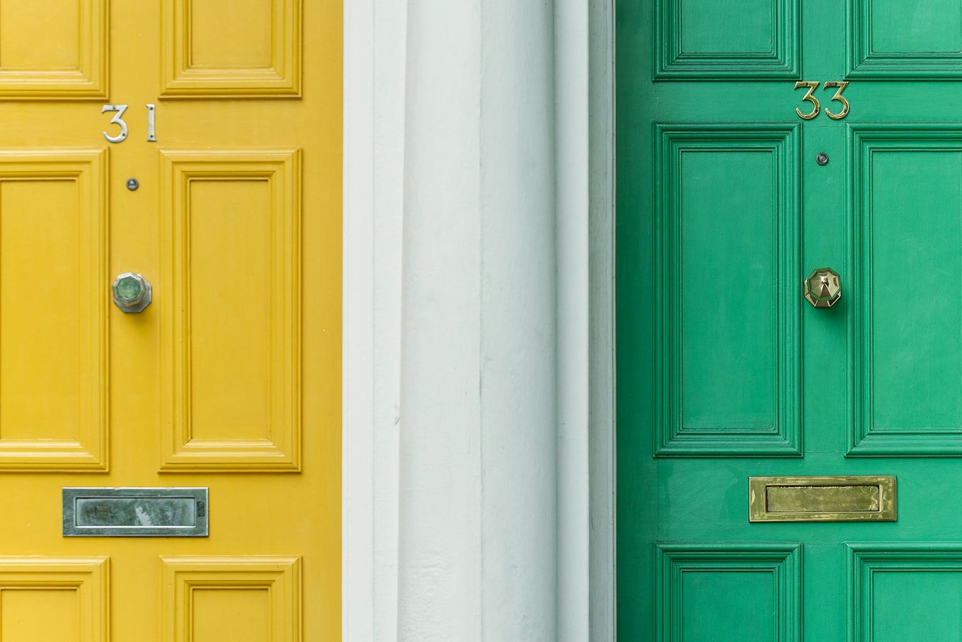 A picture of two doors, with number plates on them 31 and 33 respectively